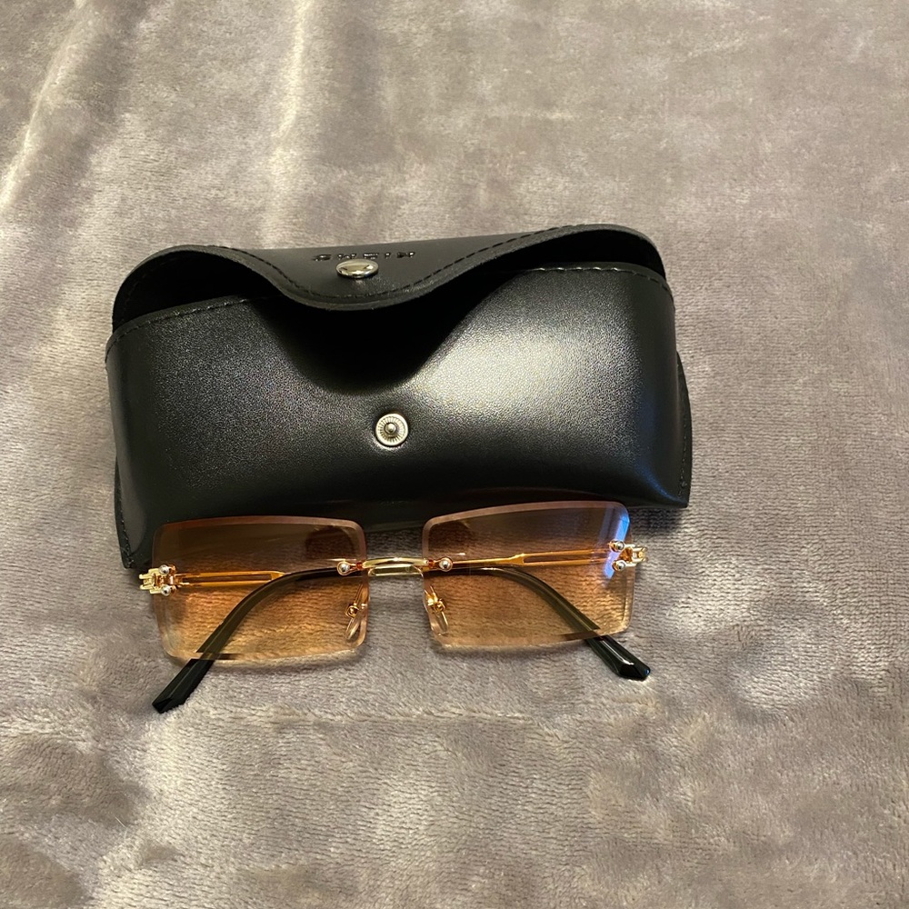 Orange sunglasses with case